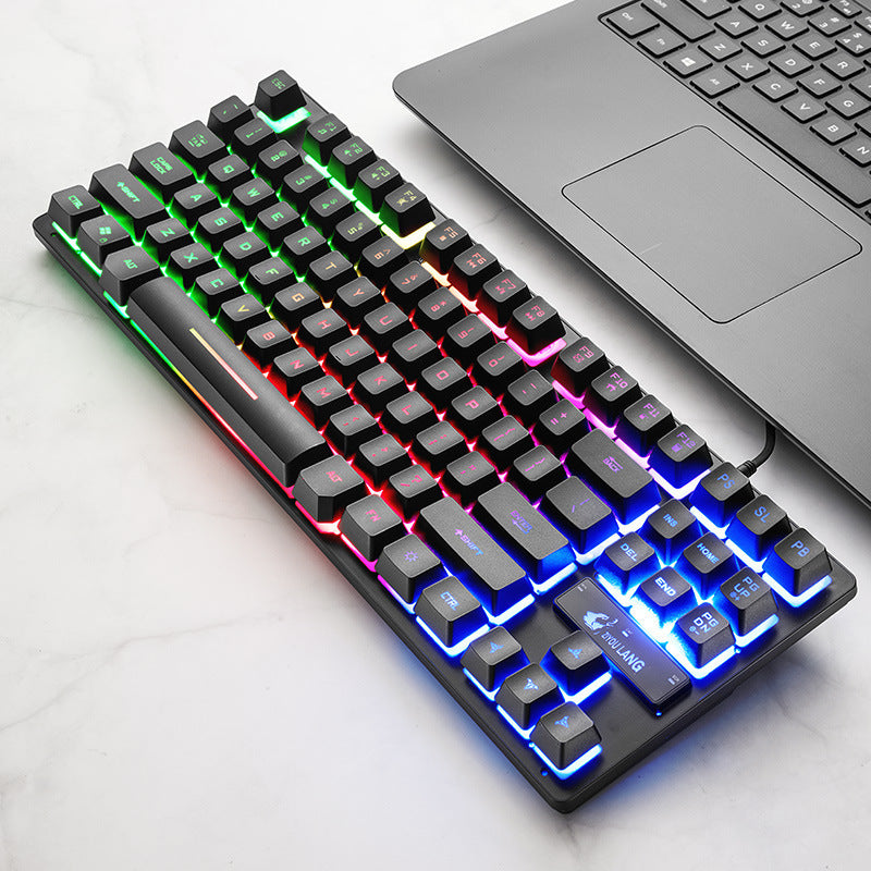 Electronic Games Mechanical Keyboard Notebook Keyboard with RGB lighting and USB interface on a marble surface.